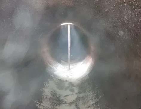 Tank interior with sludge content.